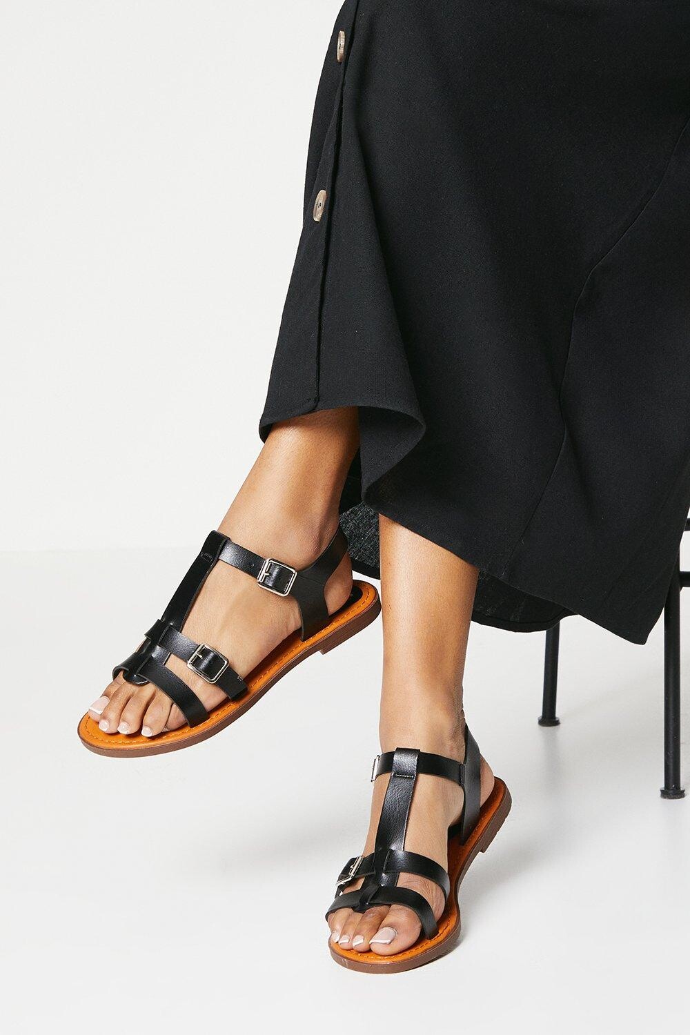 

Хорошо для подошвы: сандалии на плоской подошве Mara Comfort T Bar Dorothy Perkins, черный