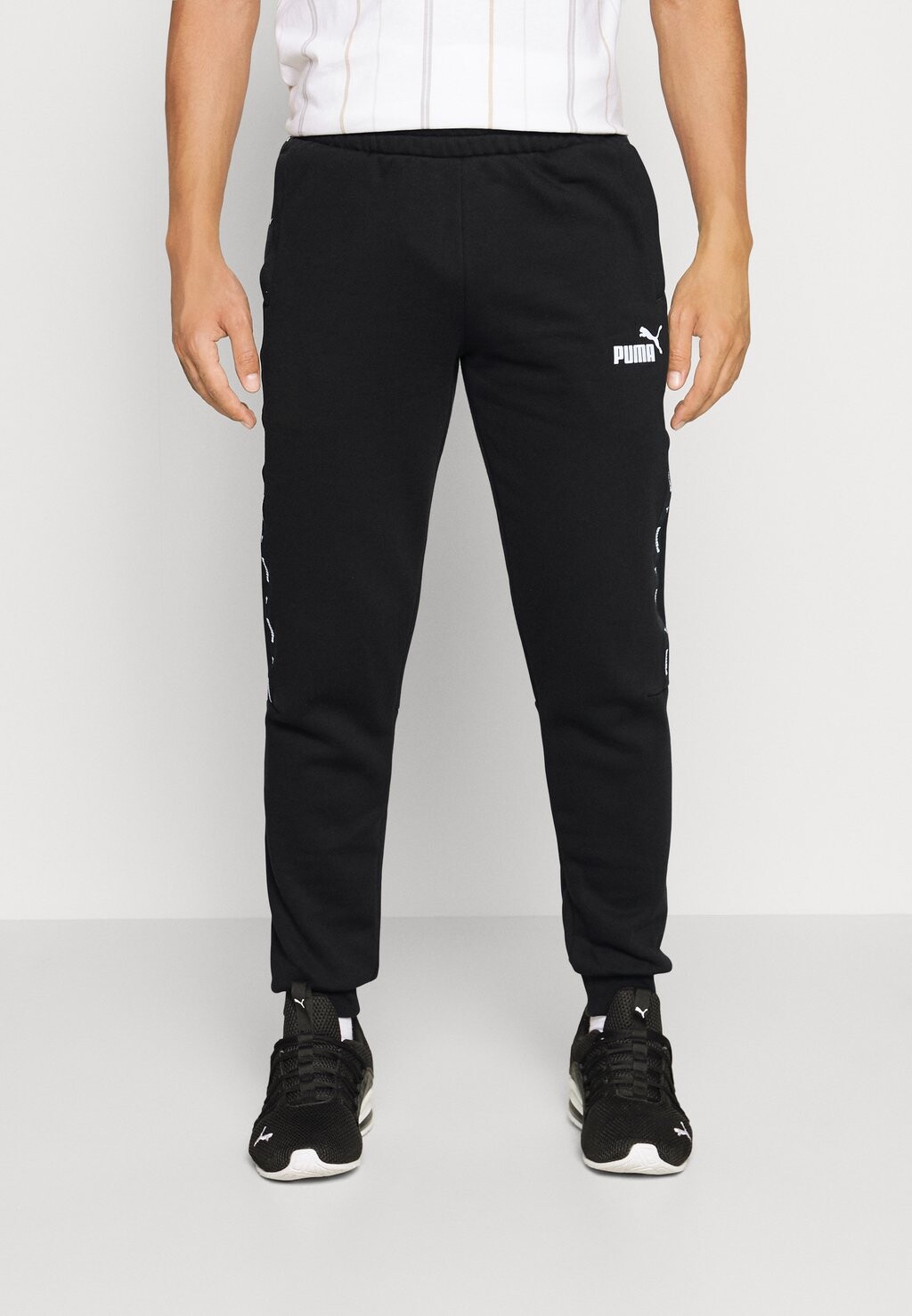 

Спортивные брюки Puma Tape, черный