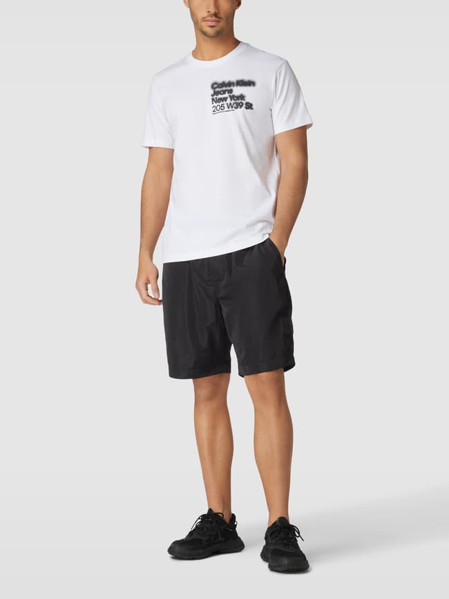 

Модель шорт в стиле батик 'GRAPHIC WOVEN SHORT' Calvin Klein Jeans, черный