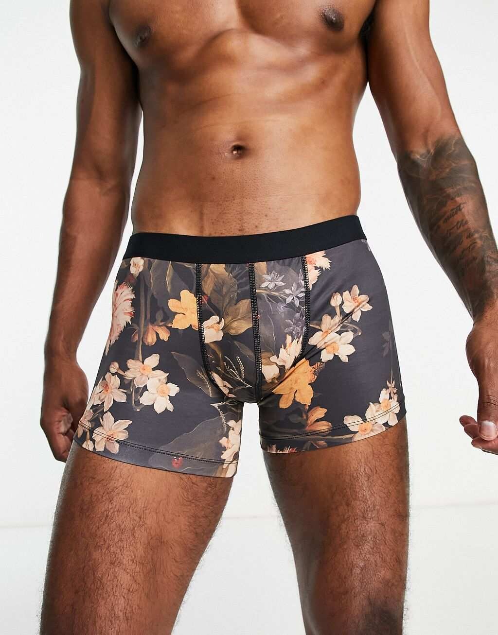 

Черные трикотажные плавки с цветочным принтом ASOS DESIGN