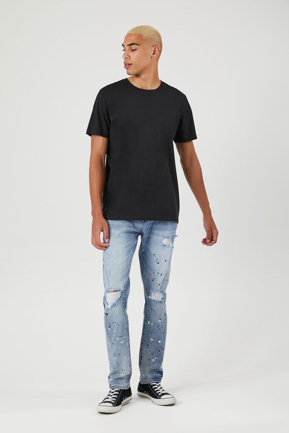 

Джинсы с потертостями и брызгами краски Forever 21, деним