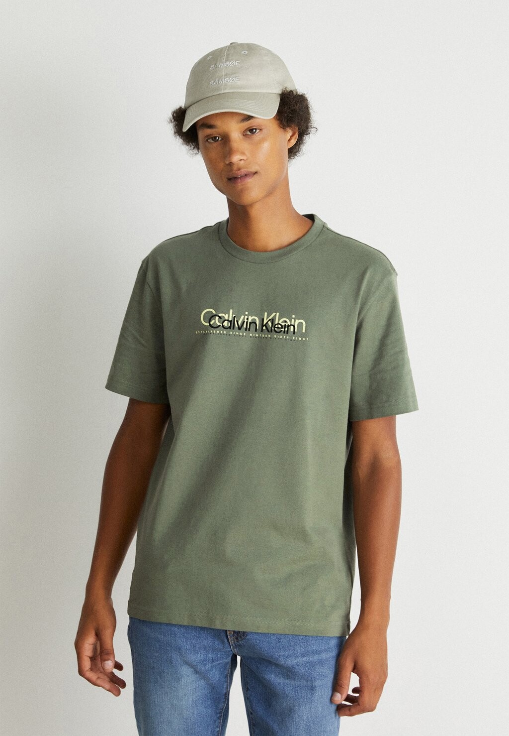 

Футболка с принтом Calvin Klein, зеленый