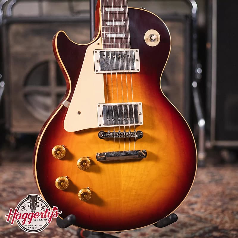 

Электрогитара Gibson Custom Shop 1958 Les Paul Standard Reissue, Left Handed - VOS Bourbon Burst with Brown/Pink Lifton Reissue 5-Latch Case