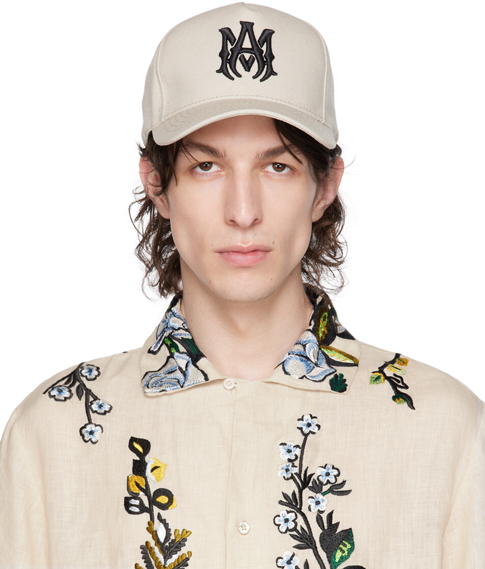

Бежевая кепка с вышивкой AMIRI