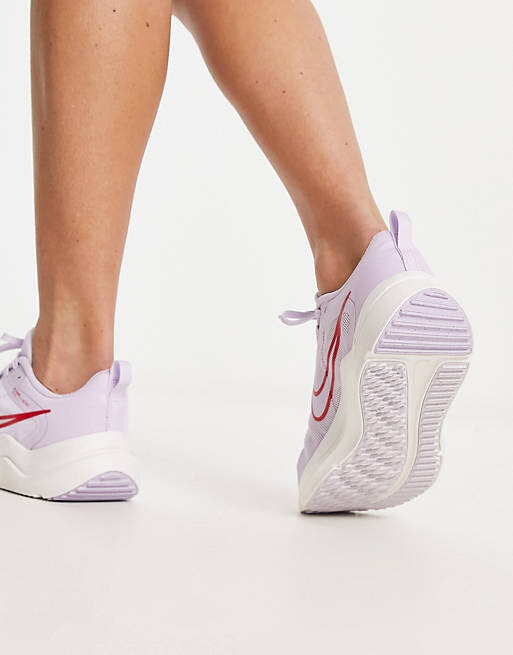 

Розовые кроссовки Nike Running Downshifter 12