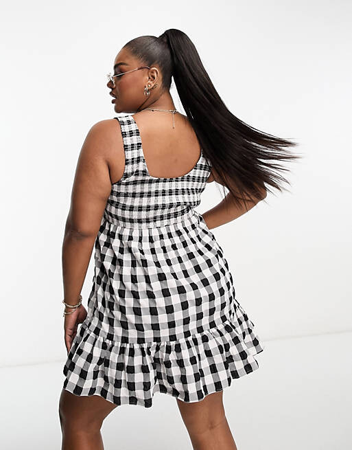 

Мини-сарафан в однотонную клетку с овальным вырезом и сборками ASOS DESIGN Curve