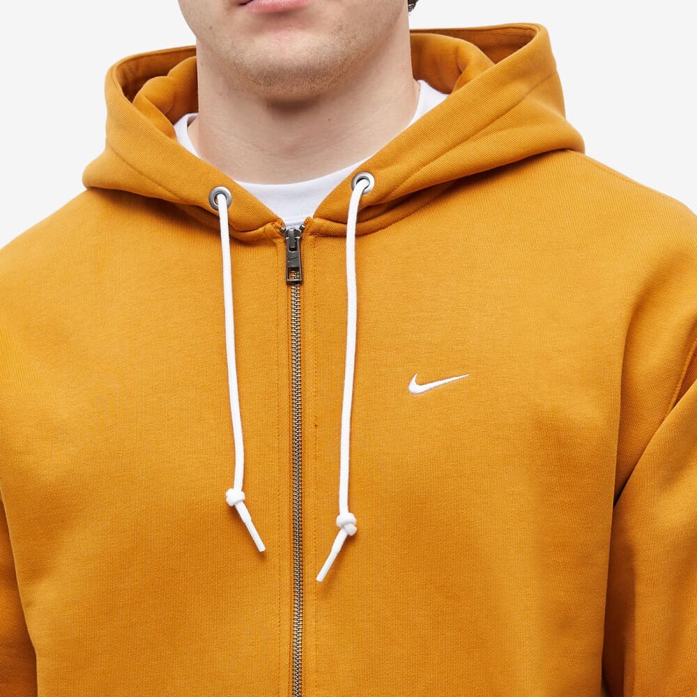 

Тяжелая худи на молнии Nike Solo Swoosh