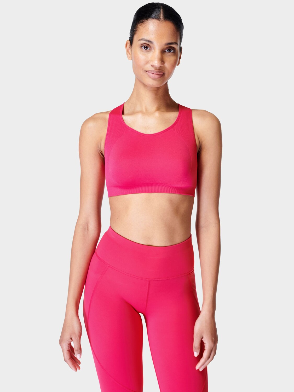 

Спортивный бюстгальтер с бретелями Sweaty Betty Stamina Form, розовый фрамбуаз