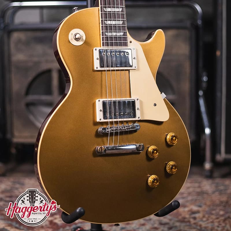 

Электрогитара Gibson 1957 Les Paul Goldtop Darkback Reissue - VOS Double Gold with Brown/Pink Lifton Reissue 5-Latch Hardshell Case