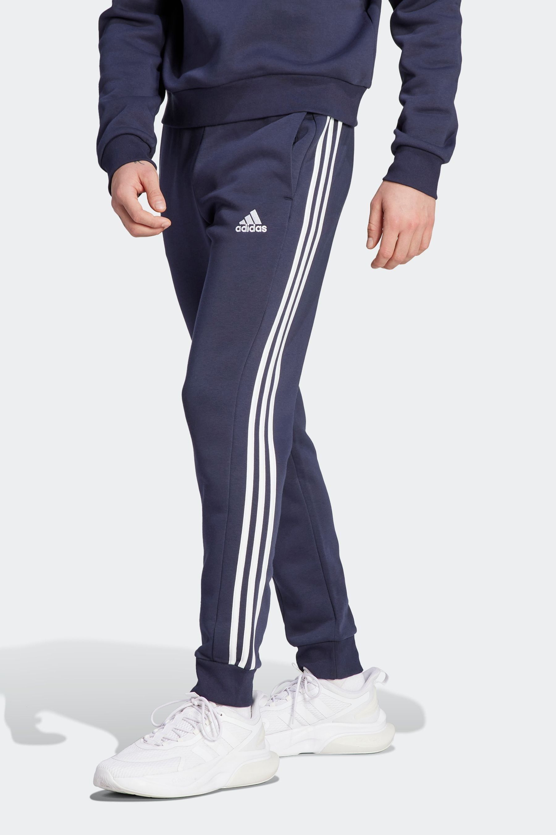 

Флисовые джоггеры Sportswear Essentials с тремя полосками и зауженными манжетами adidas, синий