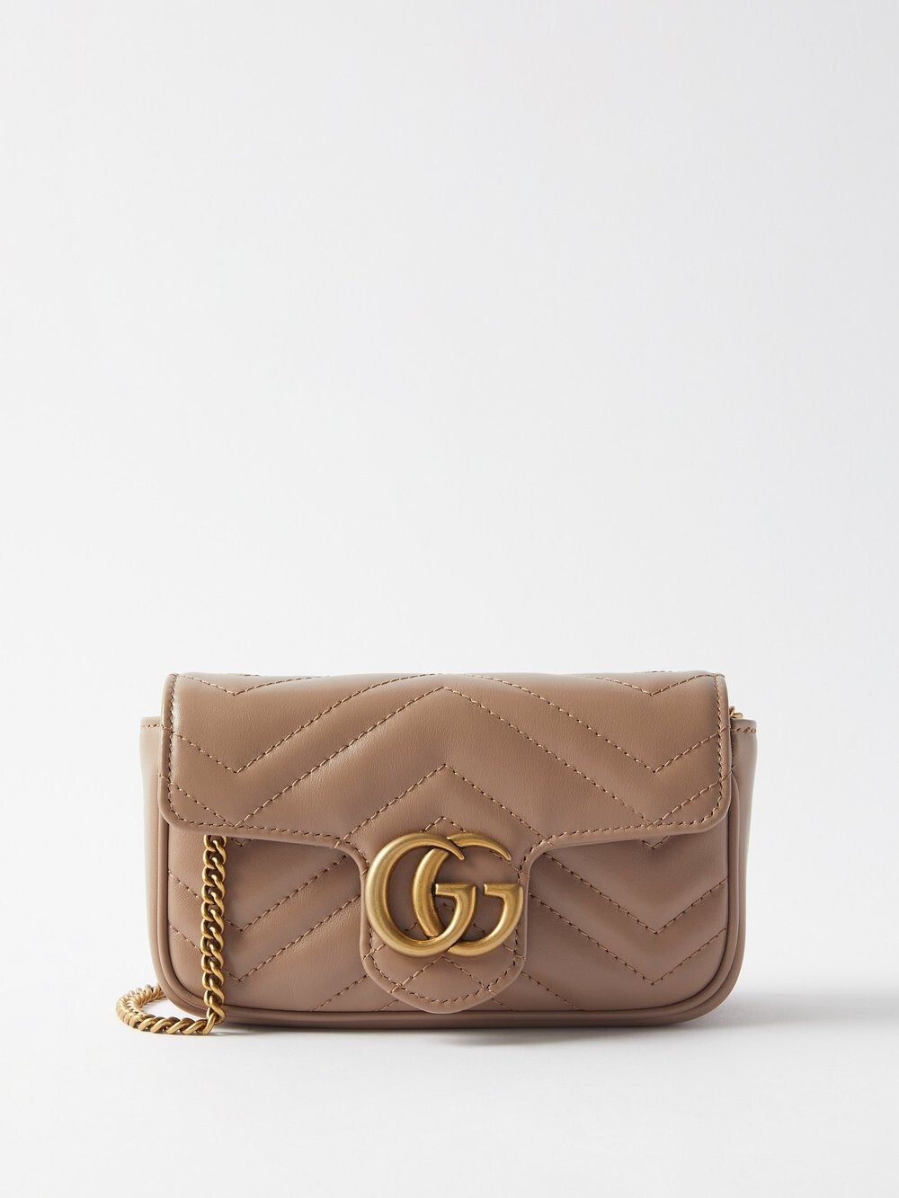 

Миниатюрная сумка через плечо из кожи матлассе gg marmont Gucci, розовый