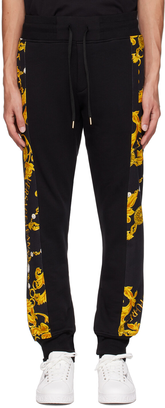 

Откутюрные спортивные штаны с черной цепочкой Versace Jeans Couture