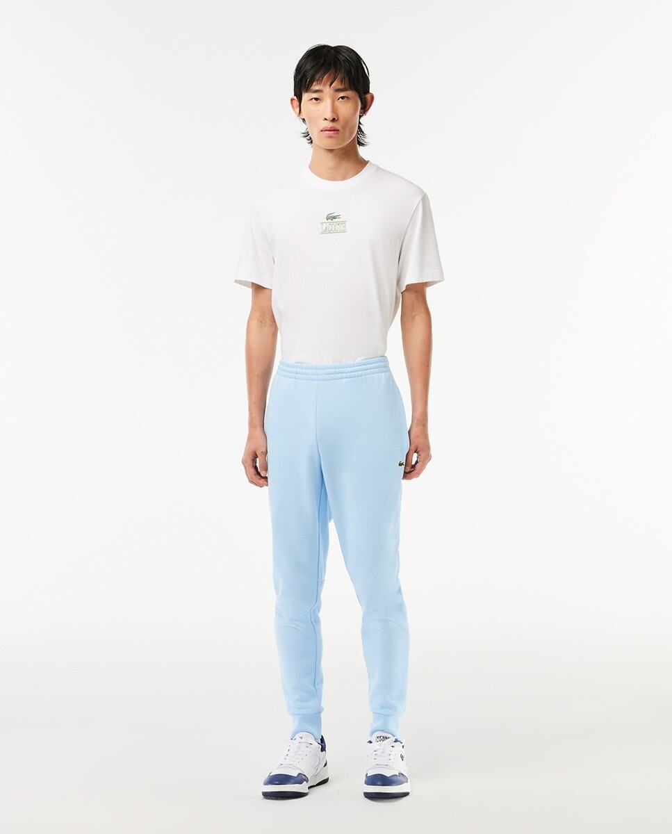 

Мужские спортивные брюки узкого кроя Lacoste, светло-синий