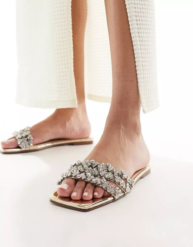 

Босоножки Simmi London Capri на плоской подошве золотого цвета с декором SIMMI Shoes
