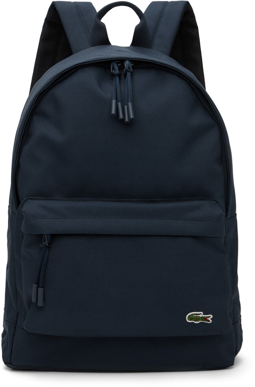

Темно-синий рюкзак с нашивками Lacoste