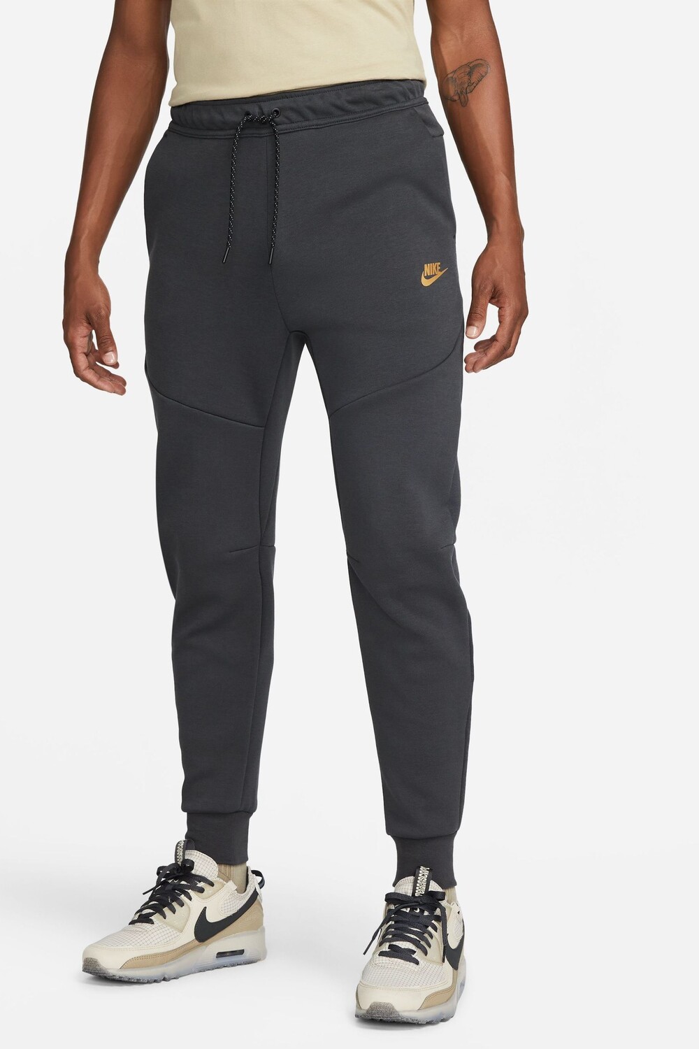 

Беговые брюки из технического флиса Nike, черный