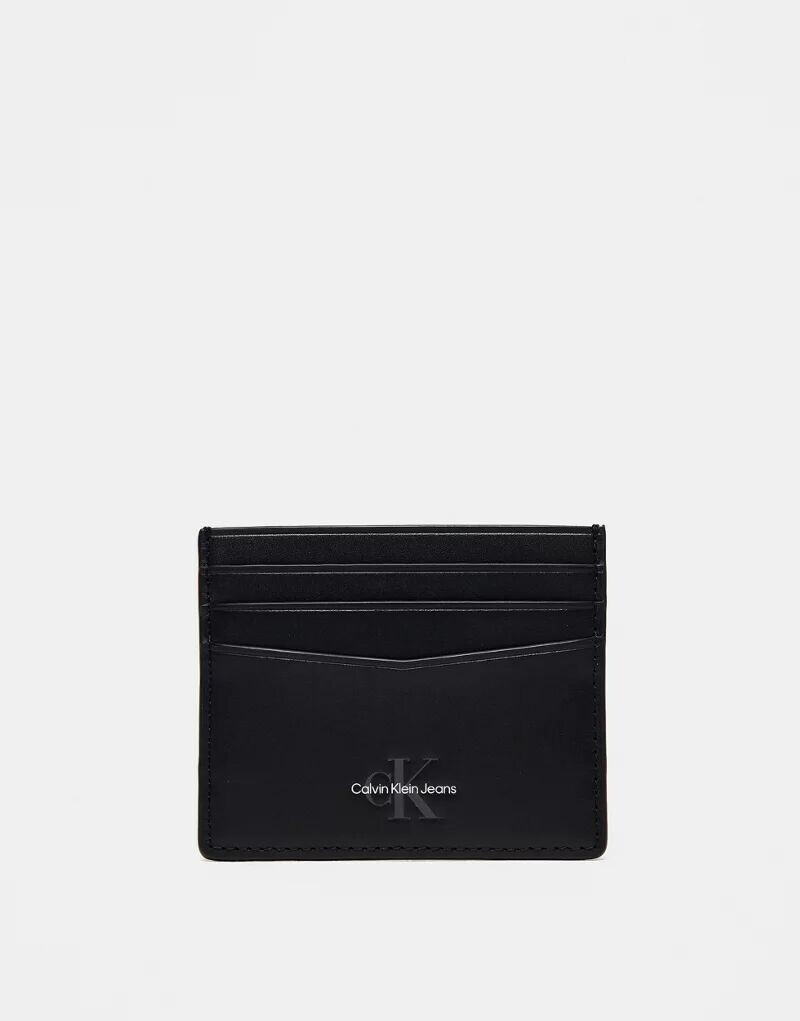 

Мягкая визитница черного цвета с монограммой Calvin Klein 6CC