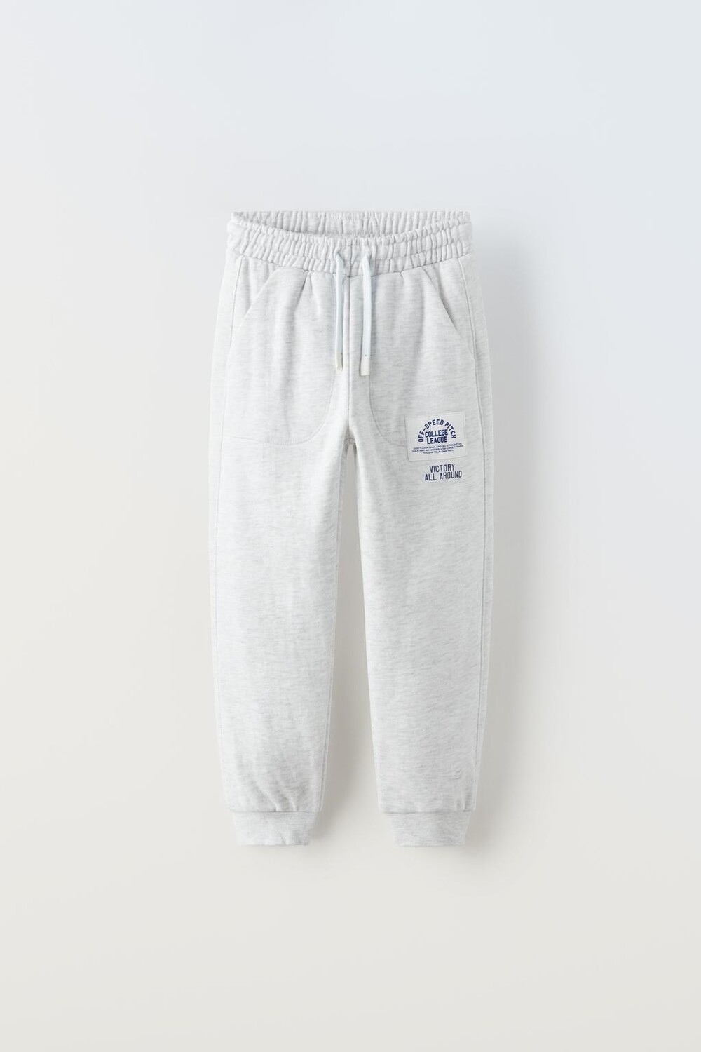 

Брюки из плюша с аппликациями этикетки ZARA, серый мергель