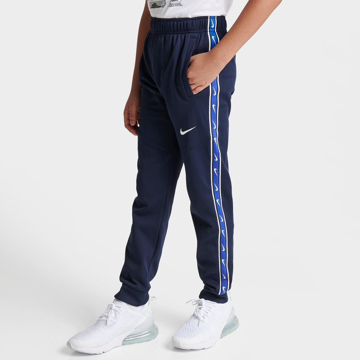 

Брюки-джоггеры с повторяющимся узором Nike Sportswear для мальчиков, синий