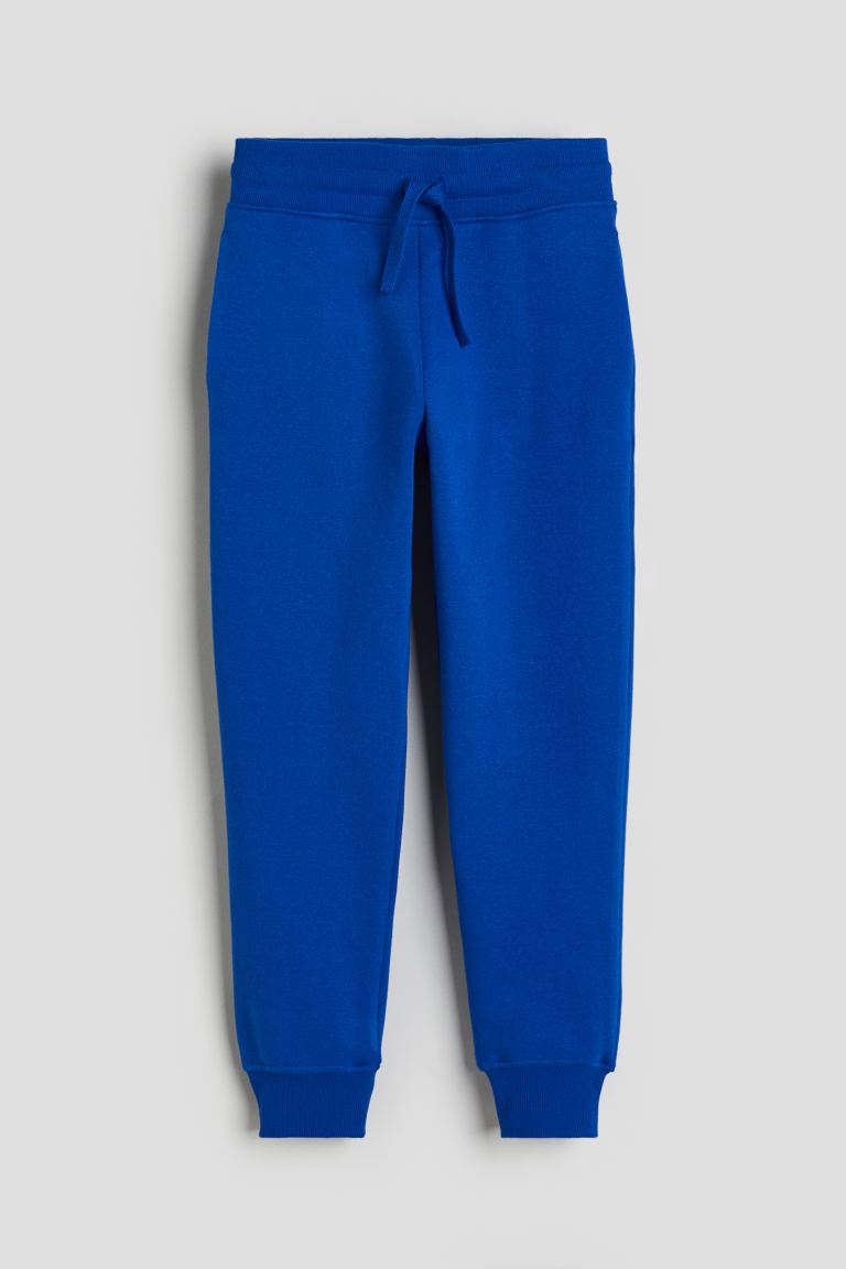 Спортивные брюки с начесом на внутренней стороне H&M, синий брюки джоггеры белый слон демисезонные карманы манжеты размер 104 синий