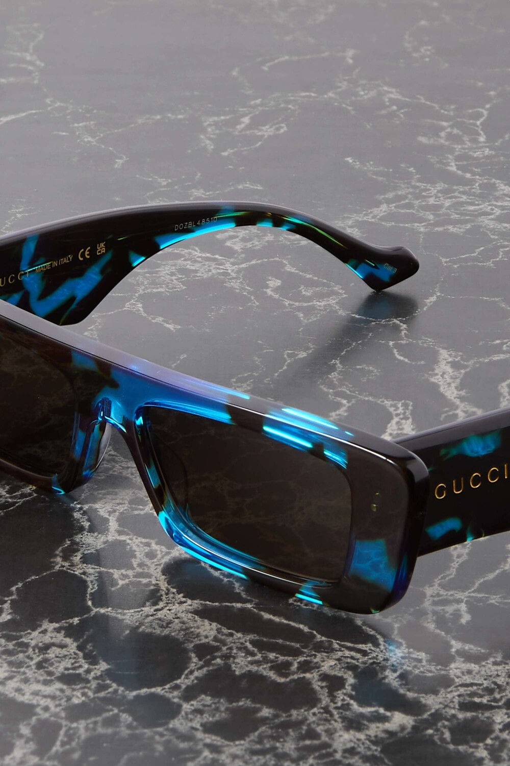 

GUCCI EYEWEAR солнцезащитные очки Gene в прямоугольной оправе из ацетата, принт черепаха