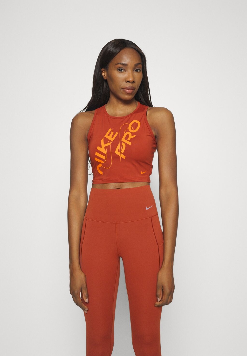 

Топ Crop Tank Nike, цвет rugged orange/safety orange