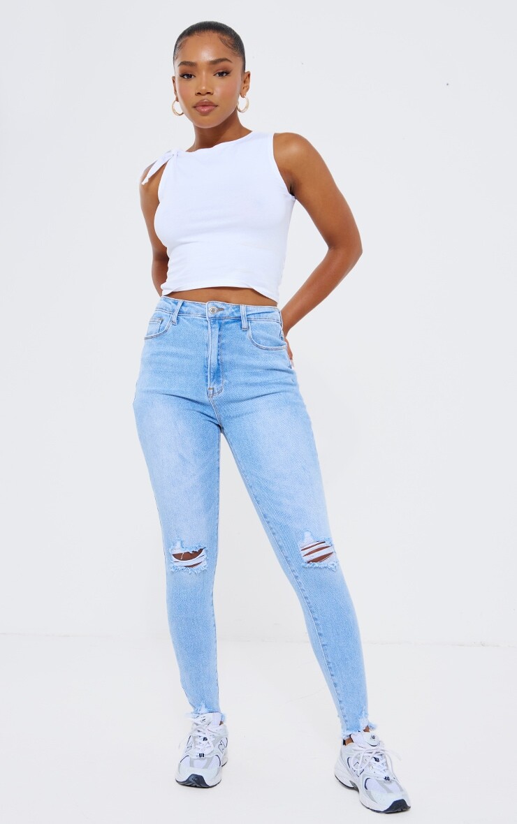 

PrettyLittleThing Голубые потертые эластичные рваные джинсы скинни с высокой посадкой