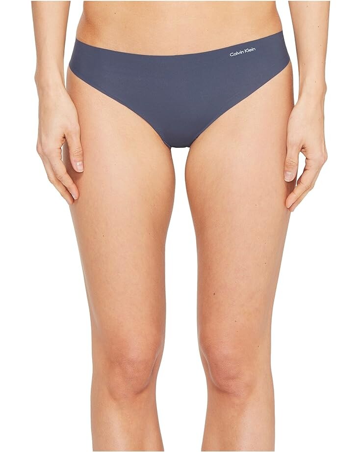 

Стринги Calvin Klein Invisibles 3-Pack Thong, цвет Speakeasy/Light Caramel/Black
