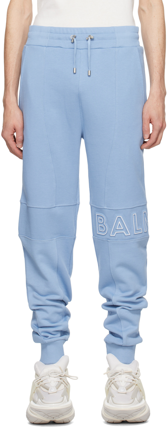 Синие спортивные штаны с тиснением Balmain