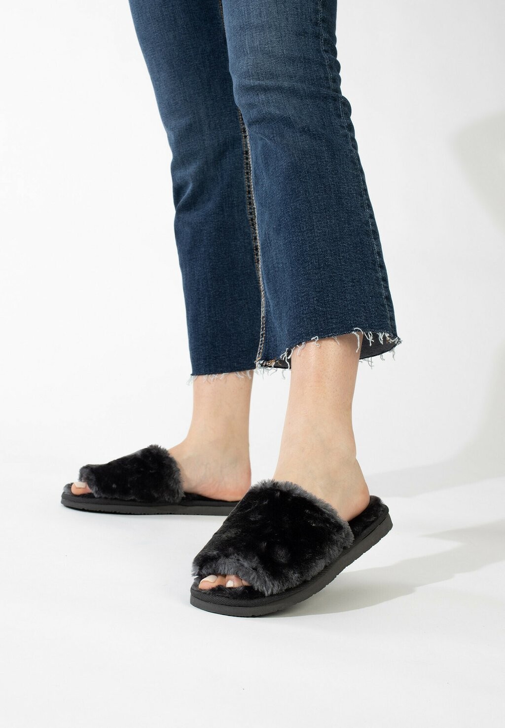 

Шлепанцы Minnetonka