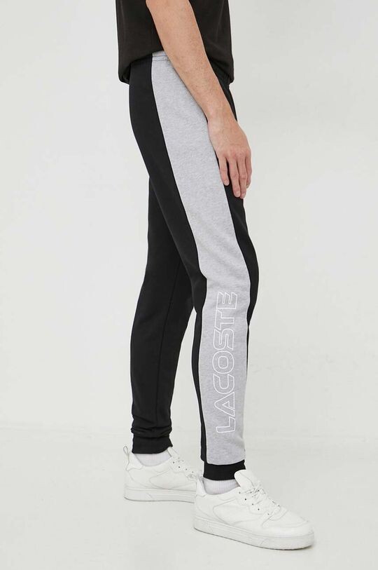 

Хлопковые спортивные брюки Lacoste, черный