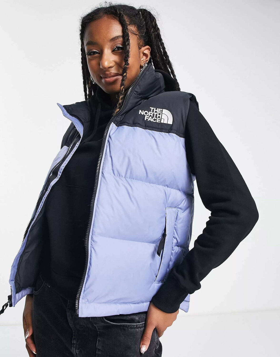 

Синий пуховый жилет The North Face 1996 Retro Nuptse