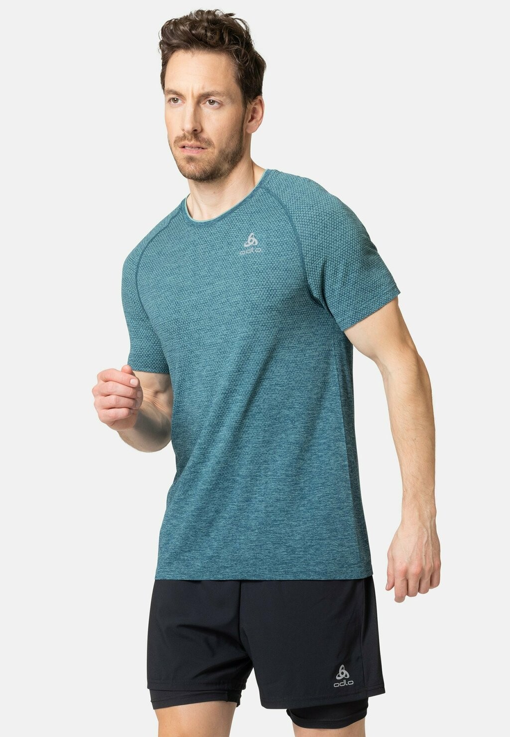 

Спортивная футболка CREW NECK ESSENTIAL SEAMLESS ODLO, цвет saxony blue melange