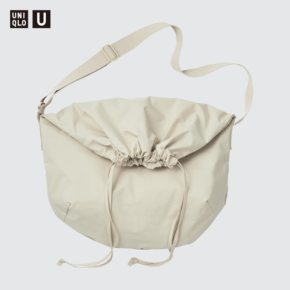 

Модель сотрудничества Uniqlo Uniqlo U, мужская и женская сумка через плечо, сумка через плечо, сумка на шнурке, сумка для отдыха и путешествий