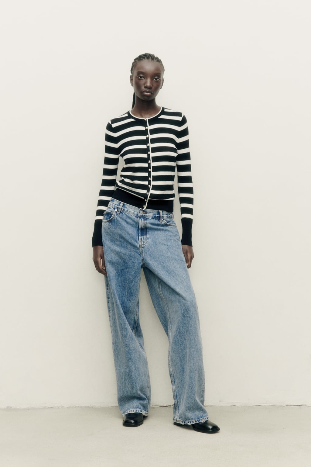 

Свитер с узлом из шерсти 100 ZARA