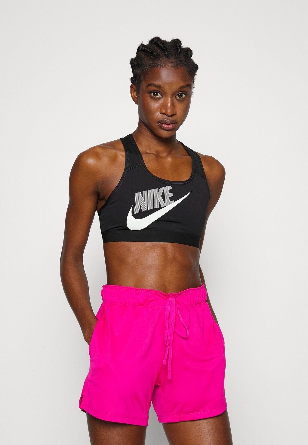 

Спортивный бюстгальтер со средней поддержкой Nike, черный