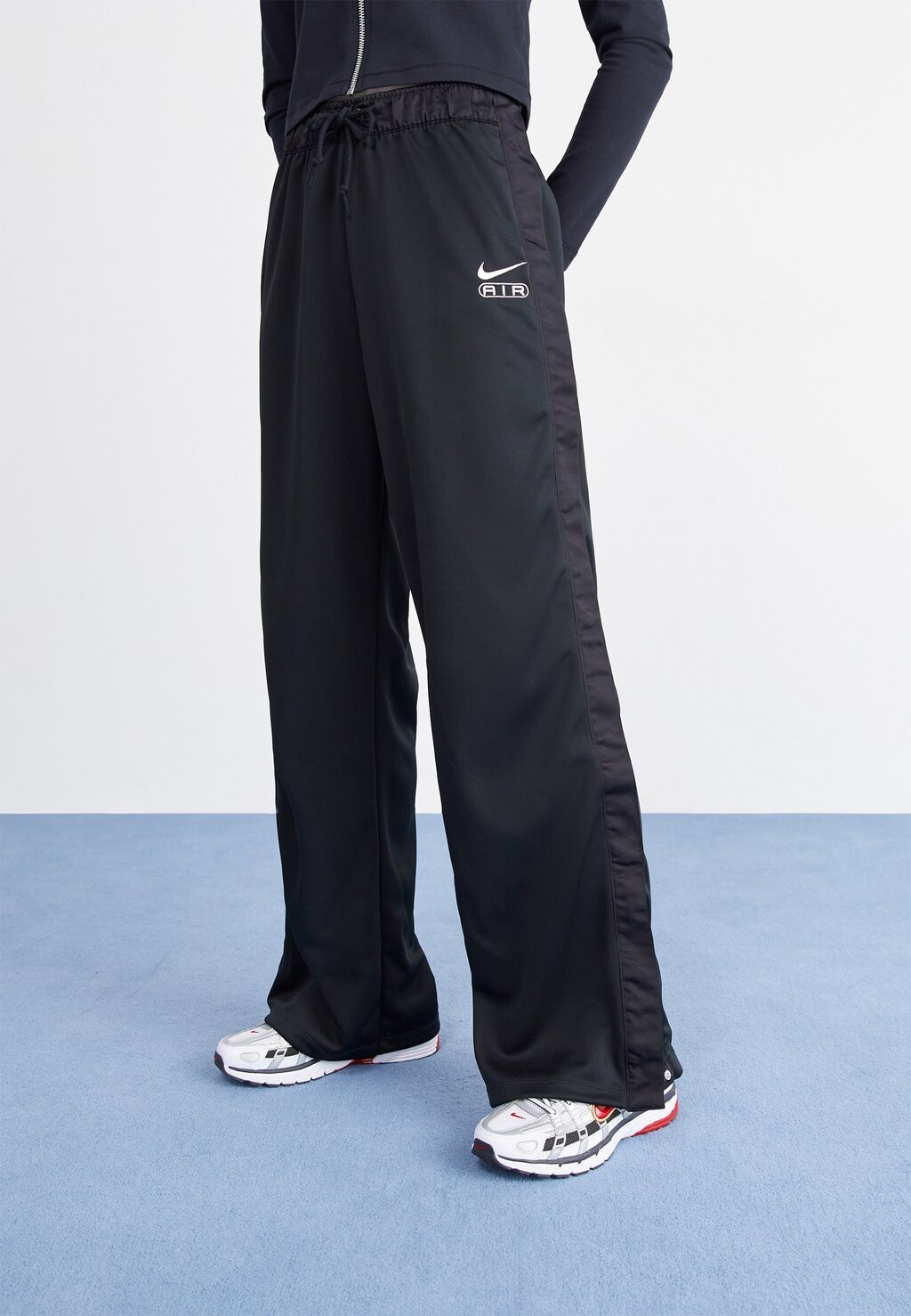 

Тренировочные брюки Nike Sportswear, черный