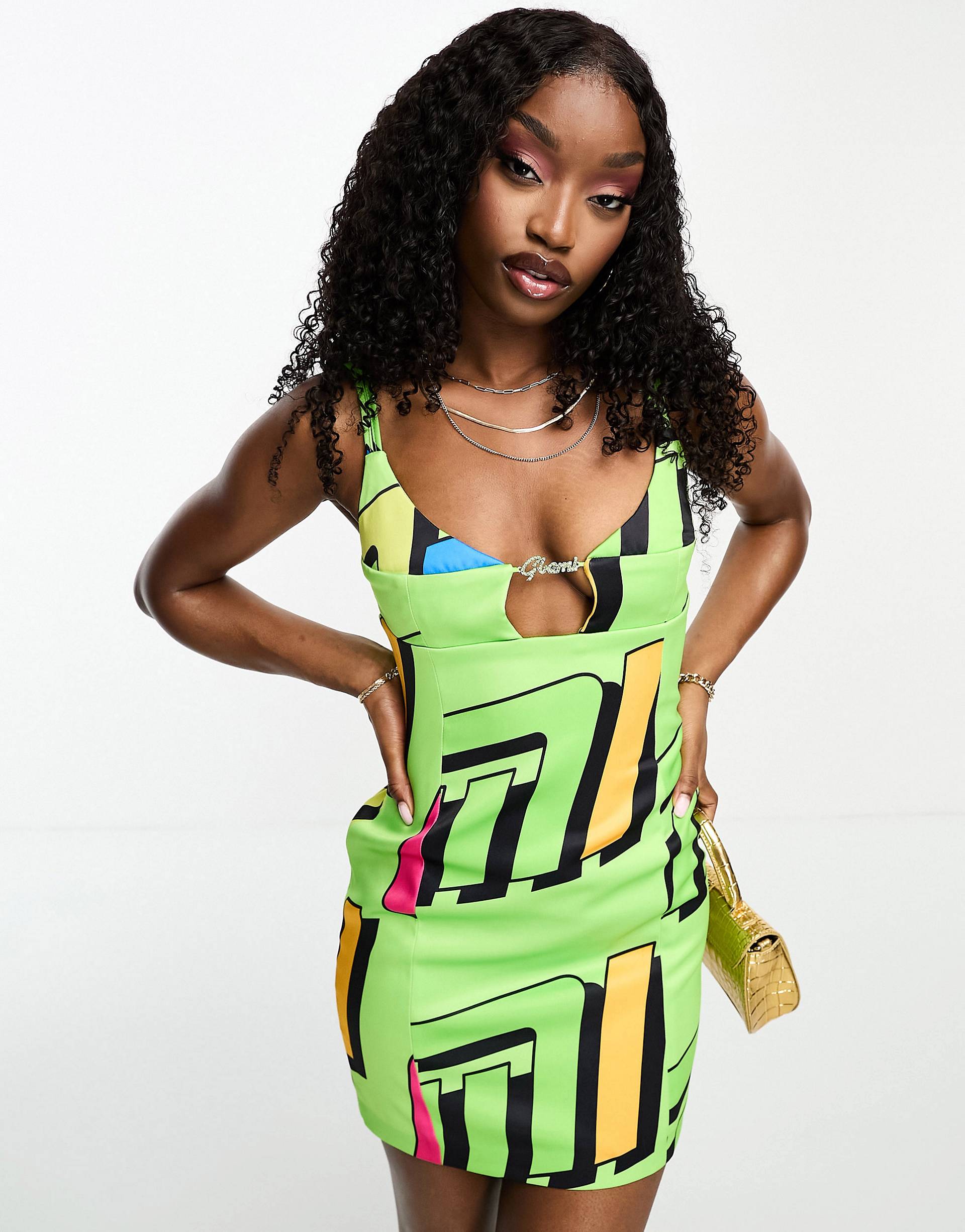 цена Зеленое атласное мини-платье с вырезами и логотипом Gbemi