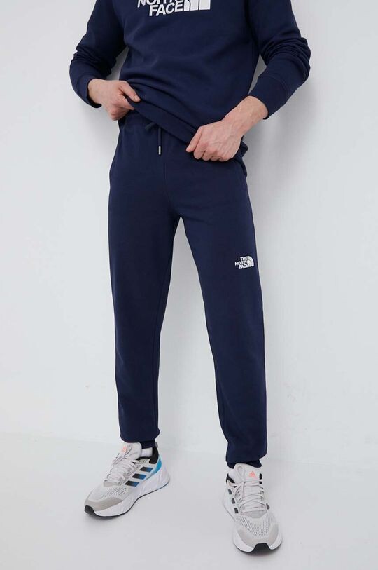 

Хлопковые спортивные штаны The North Face, темно-синий
