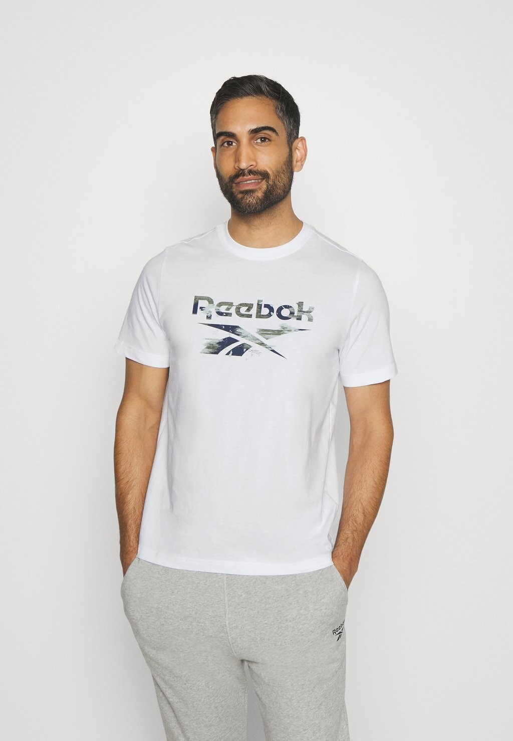 

Рубашка с принтом Reebok