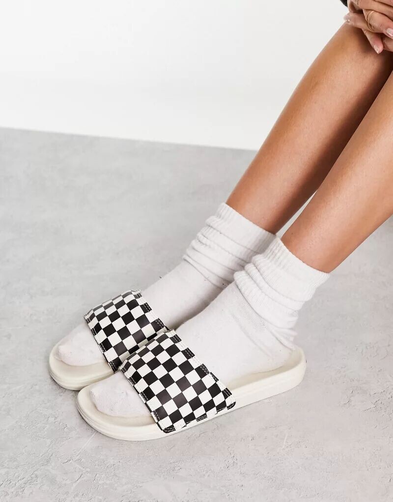 

Черно-белые шлепанцы в шахматную клетку Vans La Costa