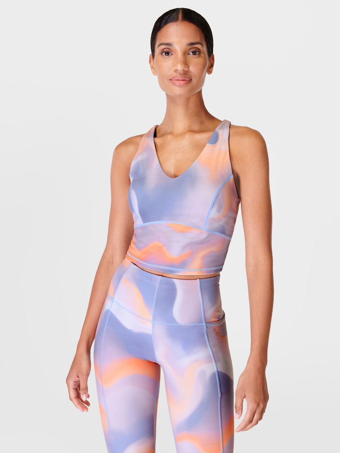 

Супермягкая укороченная майка для тренировок Sweaty Betty, оранжевый облачный принт