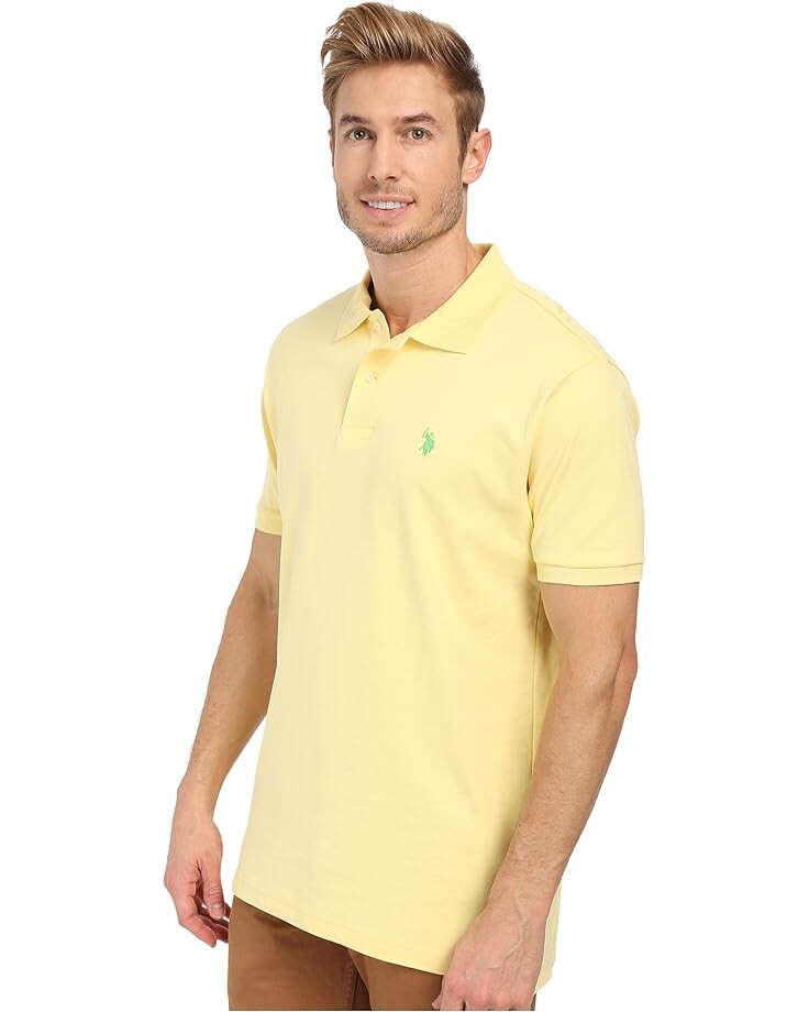 цена Поло U.S. POLO ASSN. Solid Interlock Polo, цвет Lemon Frost