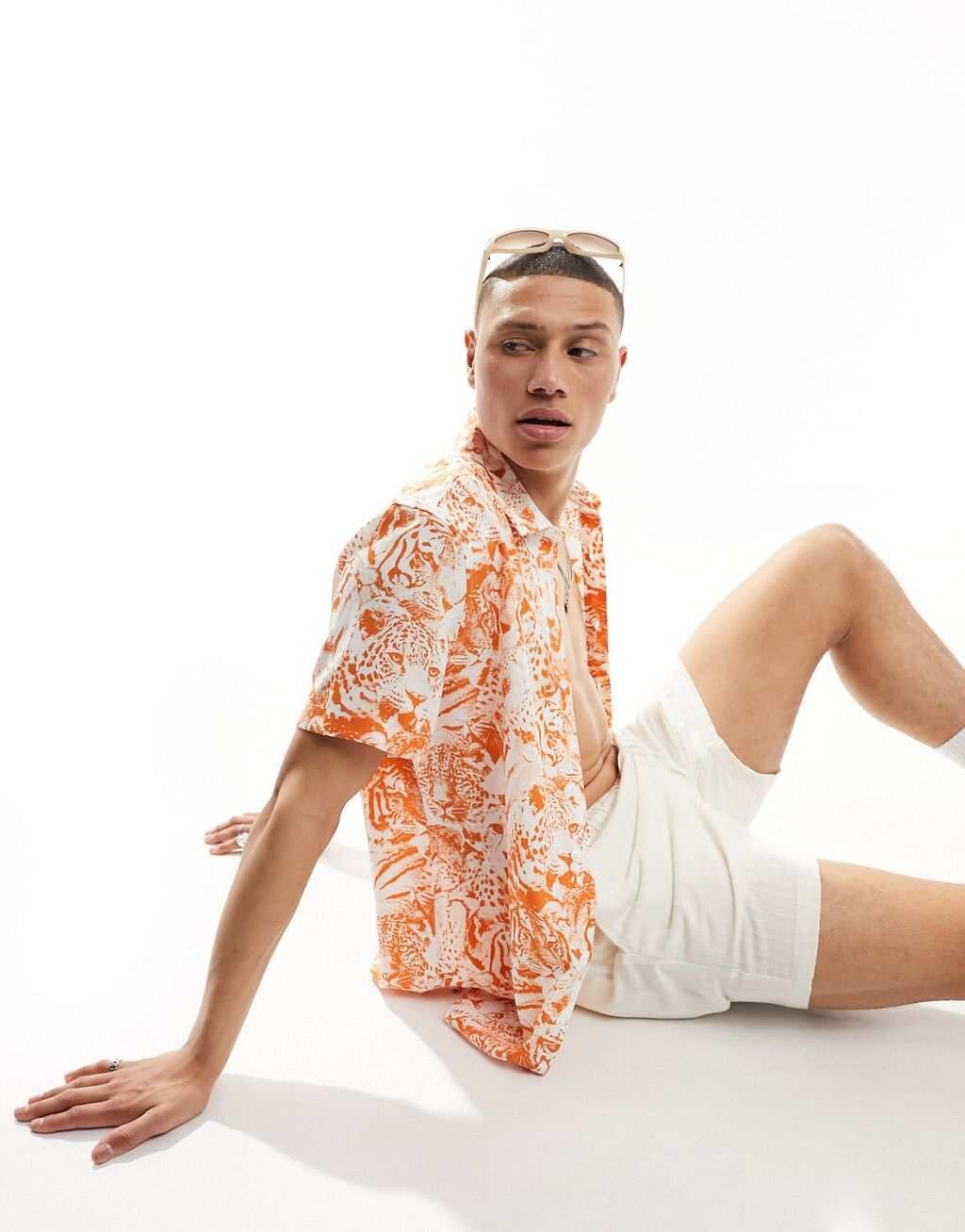 

Оранжевая рубашка с леопардовым принтом ASOS DESIGN
