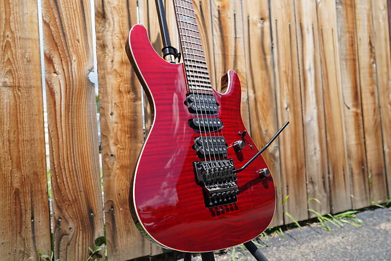 

Электрогитара Ibanez Signature Kiko Loureiro KIKO100 TRR - Transparent Ruby Red 6-String Electric Guitar w/ Hardshell Case