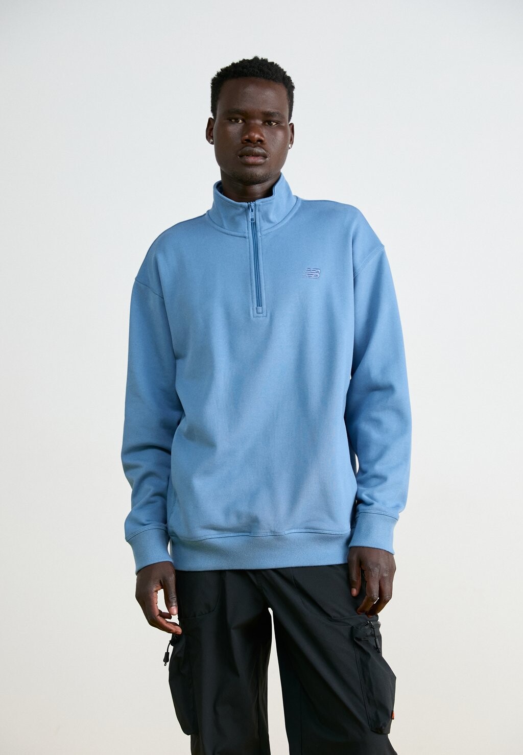 

Толстовка ATHLETICS 1/2 ZIP New Balance, синий