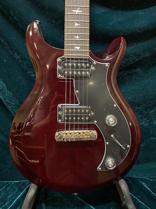 

Электрогитара PRS SE Mira Vintage Cherry With Bag On Display In Store. Does Not Come With Original Box.