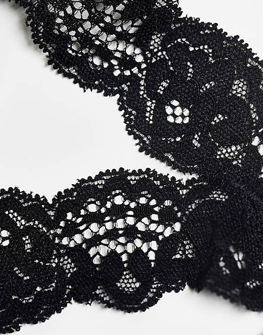 

Набор из трех черных стрингов с сетчатыми ремешками и вырезами ASOS DESIGN