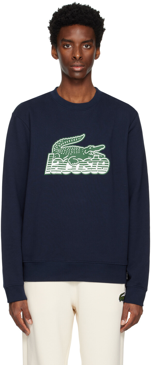 

Темно-синий свитшот с принтом Lacoste