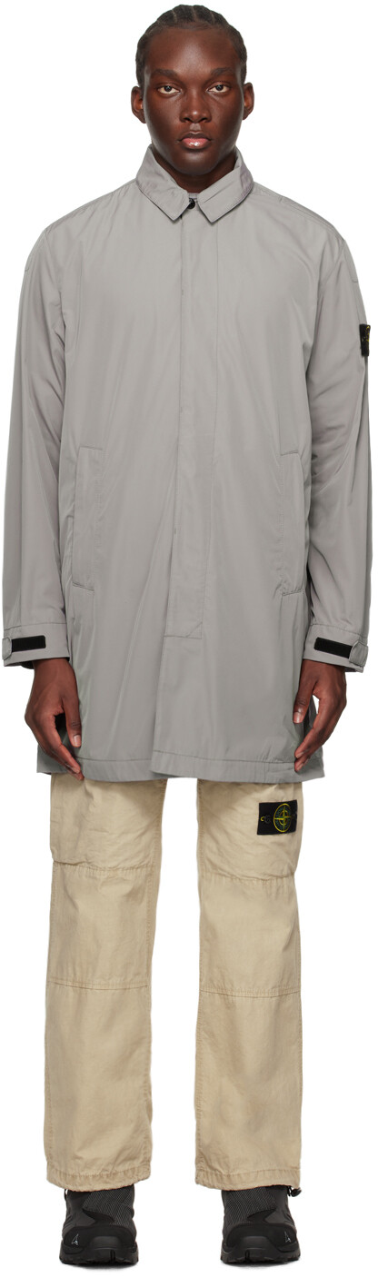 

Серое пальто с нашивками Stone Island, цвет Dove grey